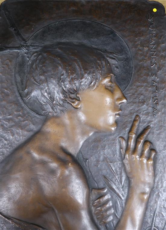 An embossed terracotta panel inscribed St. Johannes Baptist H.26in.